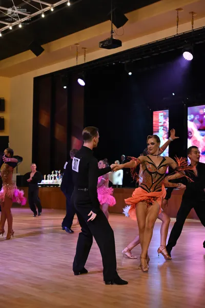Dancesport competitor #307: Man in foreground: black suit