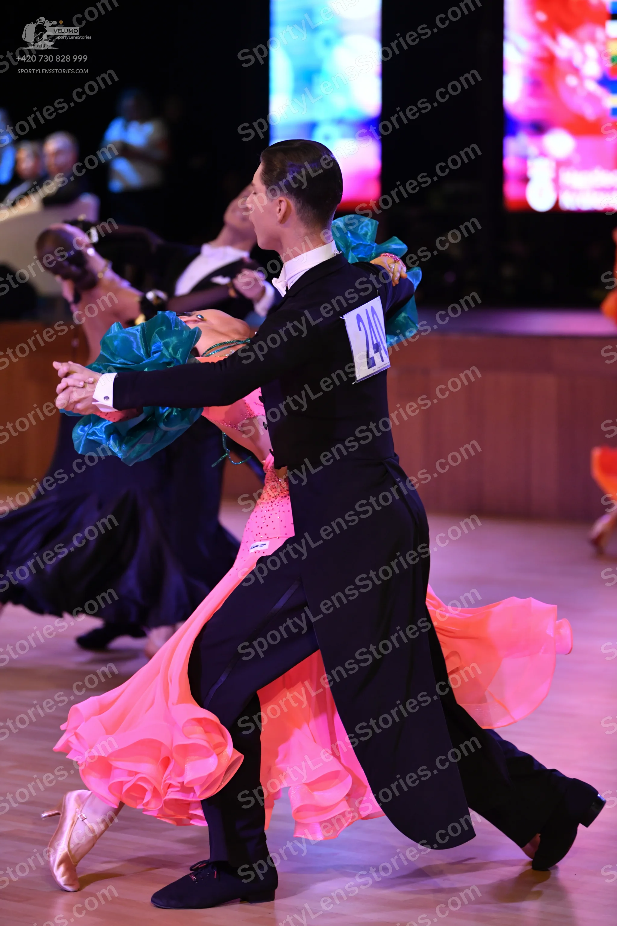 Dancesport competitor: ** Black tailsuit