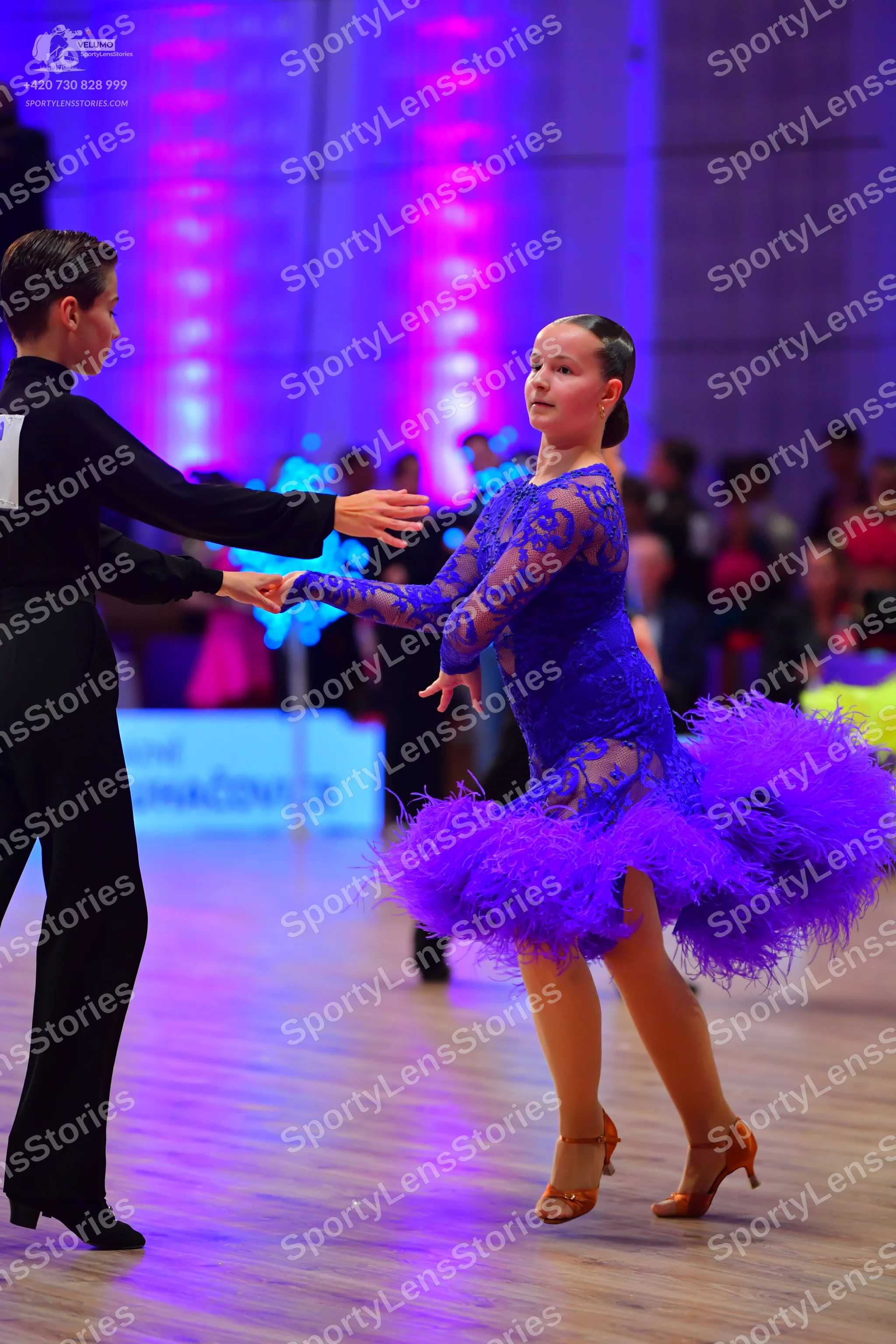 Dancesport competitor: Male dancer: black long-sleeved shirt and black trousers