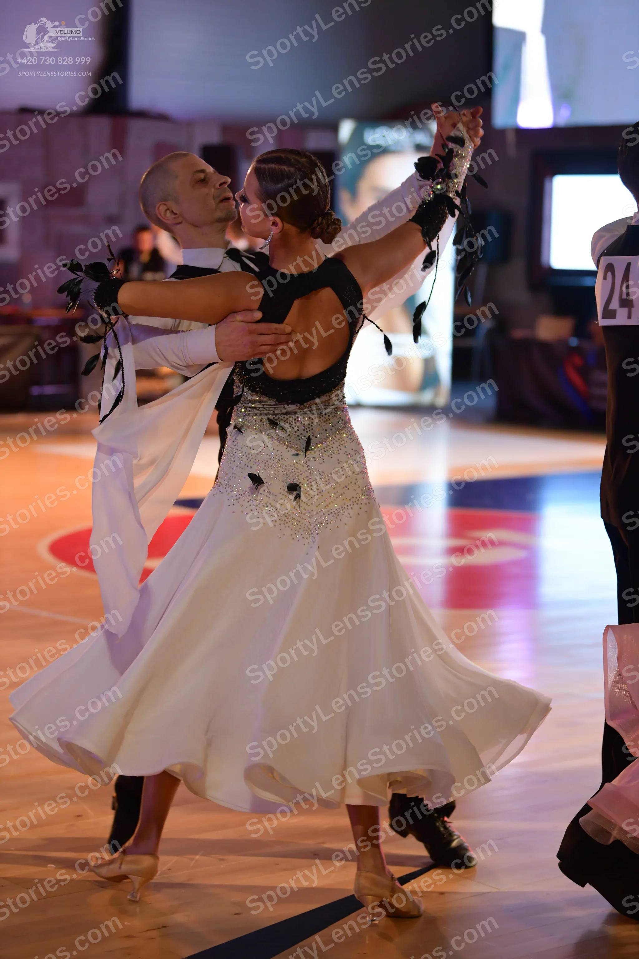 Dancesport competitor #24: Male dancer: white long-sleeved shirt