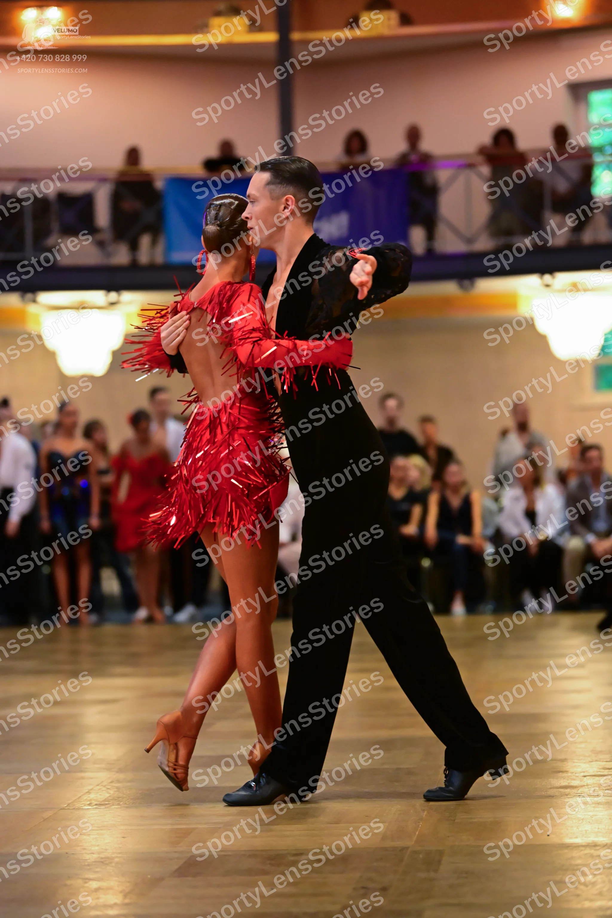 Dancesport competitor: Male dancer: black suit