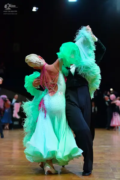 Dancesport competitor: Male dancer: black suit