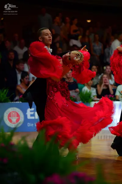Dancesport competitor: Male dancer: black suit