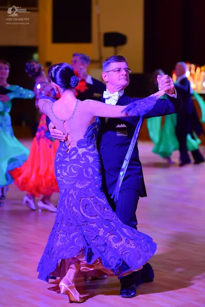 Dancesport competitor: ** Black tail suit