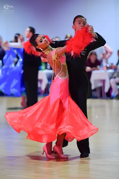 Dancesport competitor: Male dancer: black suit