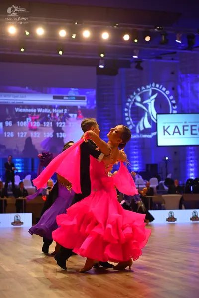 Dancesport competitor: Male dancer: black suit