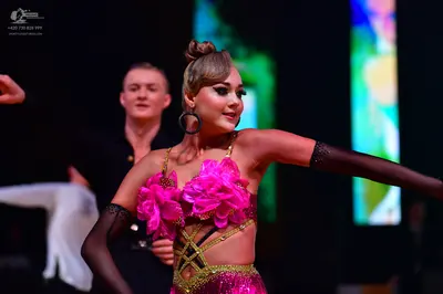 Dancesport competitor: Male dancer: black shirt