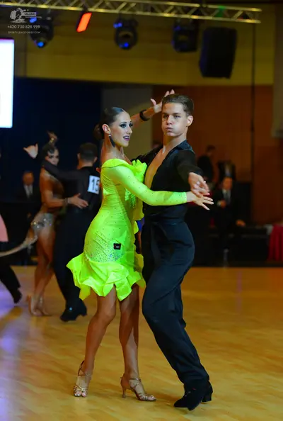 Dancesport competitor: ** Red Latin dress