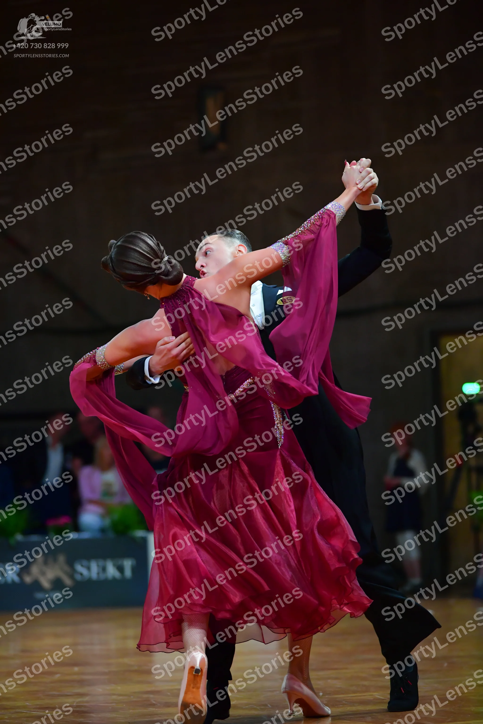 Dancesport competitor: Male dancer: black suit