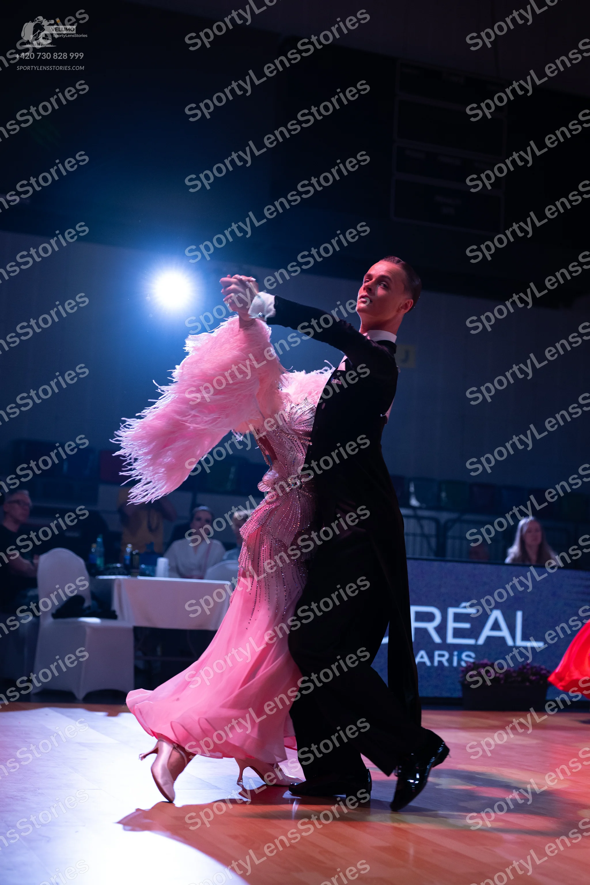 Dancesport competitor: Male dancer: black suit with white shirt and black bowtie