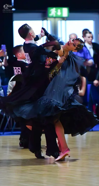 Dancesport competitor #36: Male dancer: black suit with white shirt