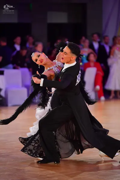 Dancesport competitor #50: Male dancer: black ballroom tailcoat