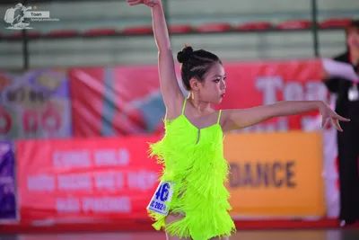 Dancesport competitor: ** Yellow/Lime Green
*   **Fabric:** Shiny, likely satin or a similar sheen mate