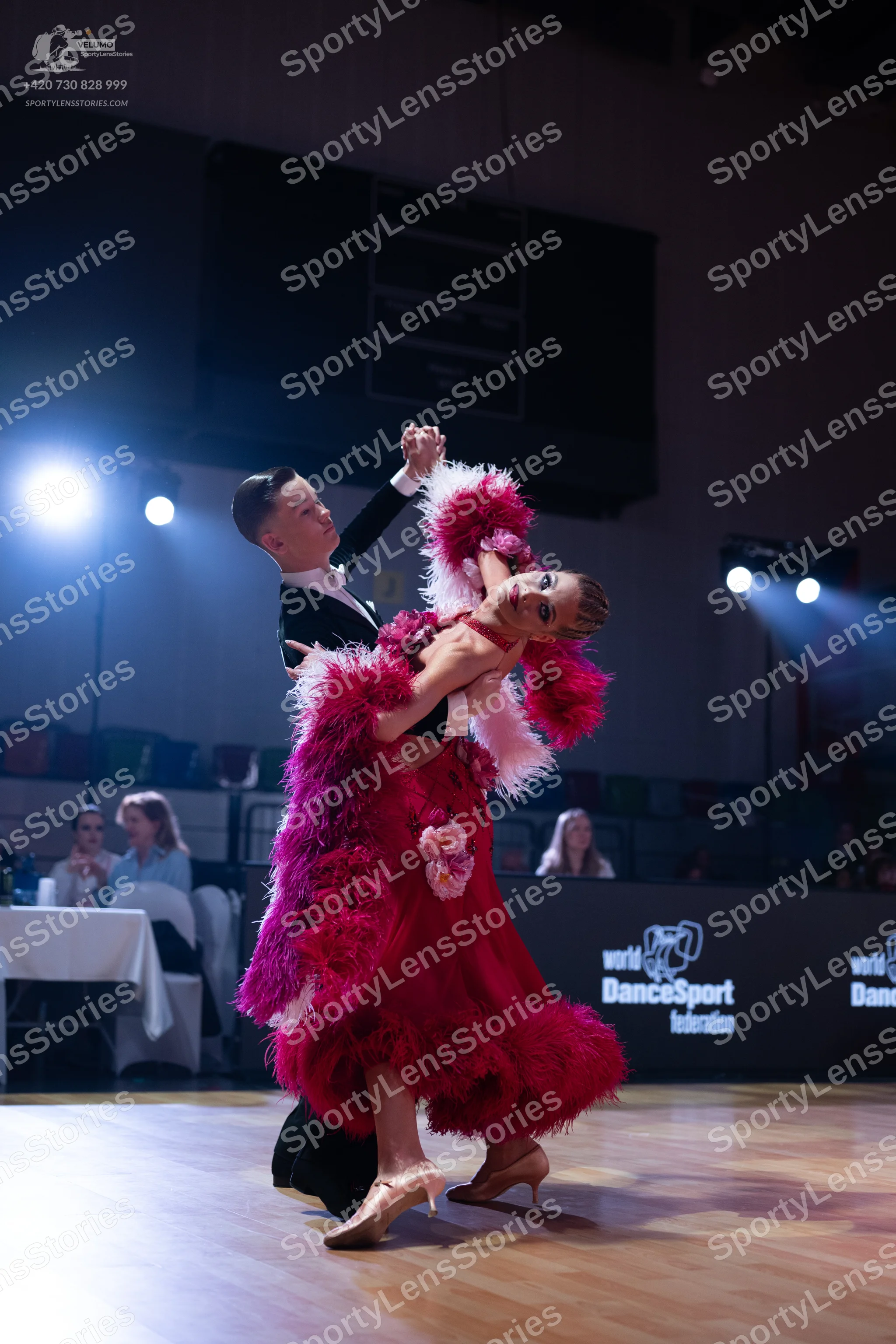 Dancesport competitor: Male dancer: black suit, white shirt, and black bow tie