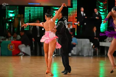 Dancesport competitor: Male dancer: black dance shirt and black trousers