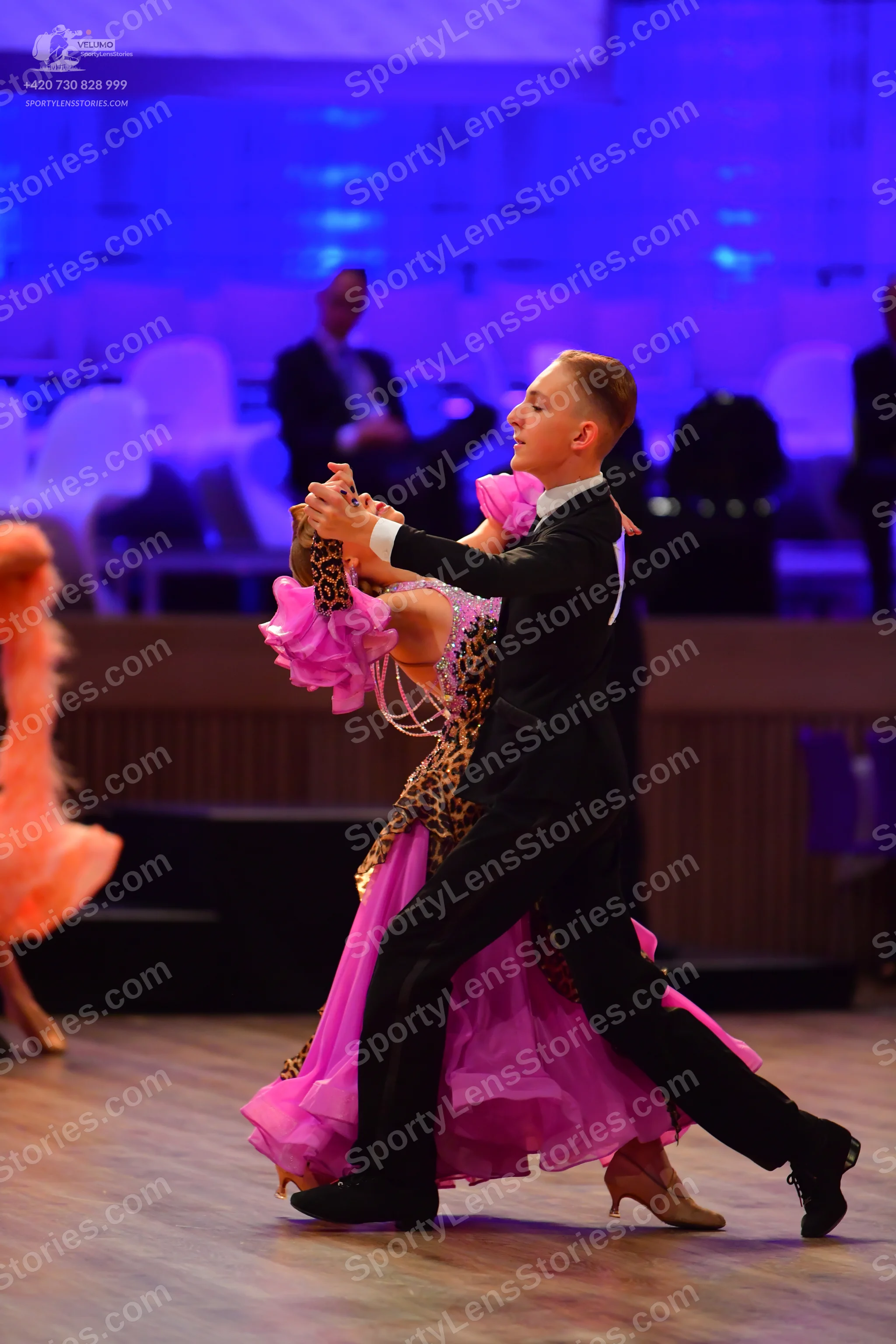 Dancesport competitor: Male dancer: black suit