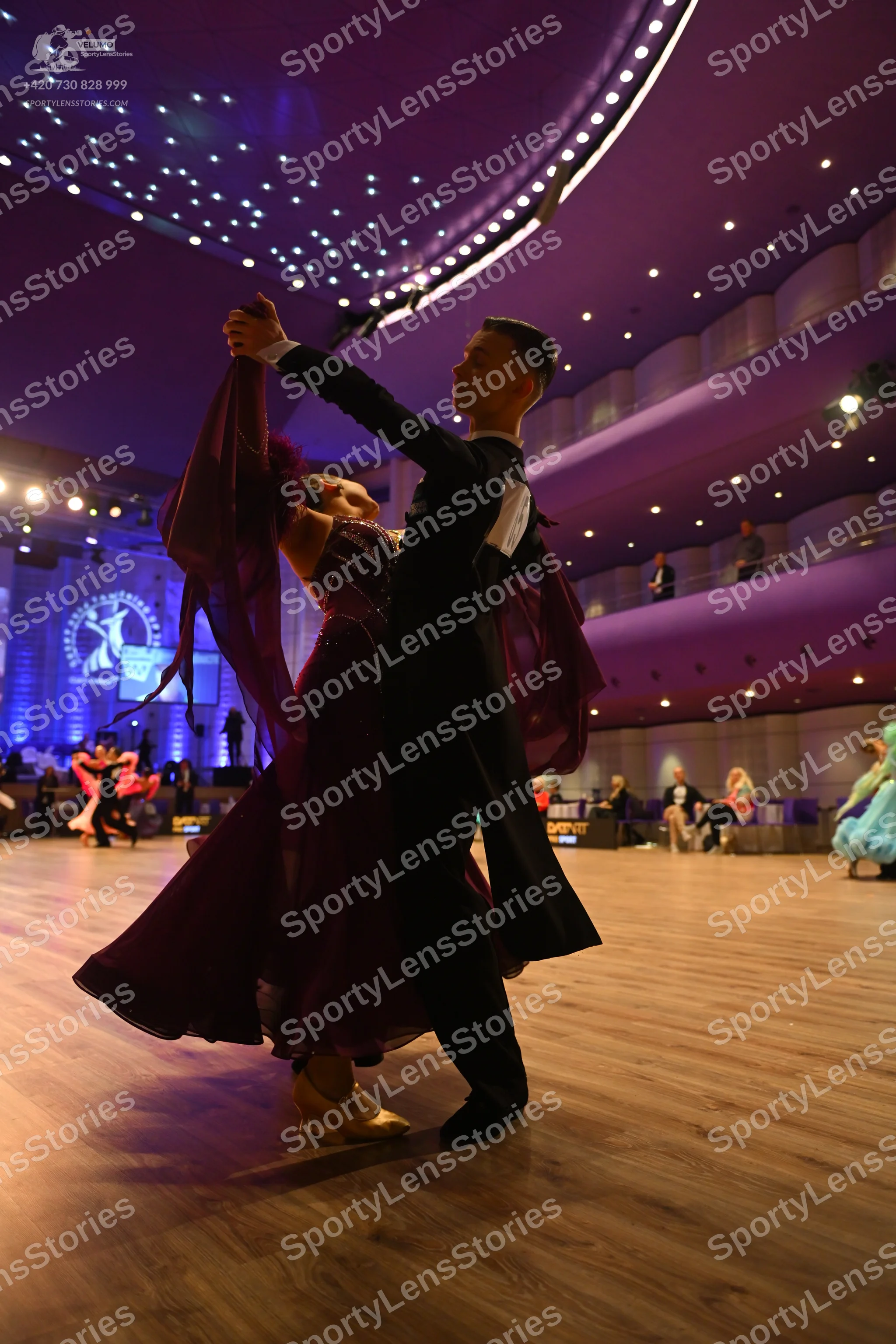 Dancesport competitor: Main male dancer: black ballroom tailcoat and trousers