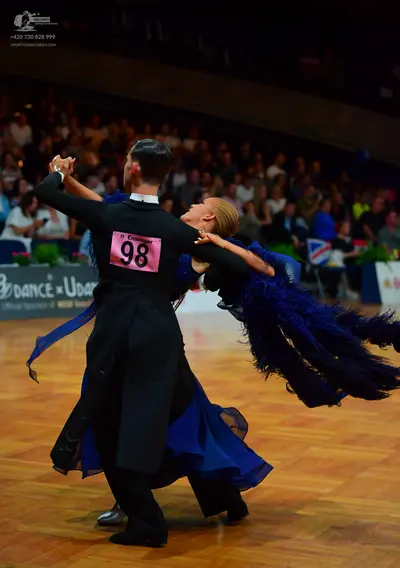 Dancesport competitor: Male dancer: black suit