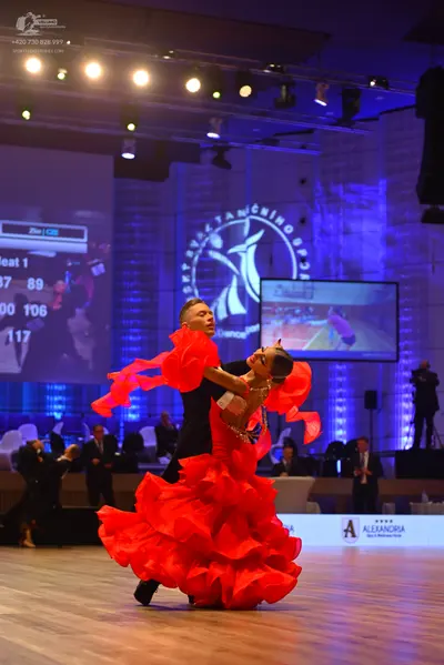 Dancesport competitor: Male dancer: black suit