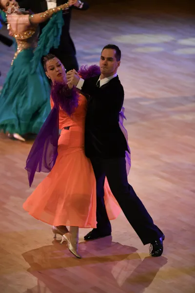 Dancesport competitor: ** Black tailsuit