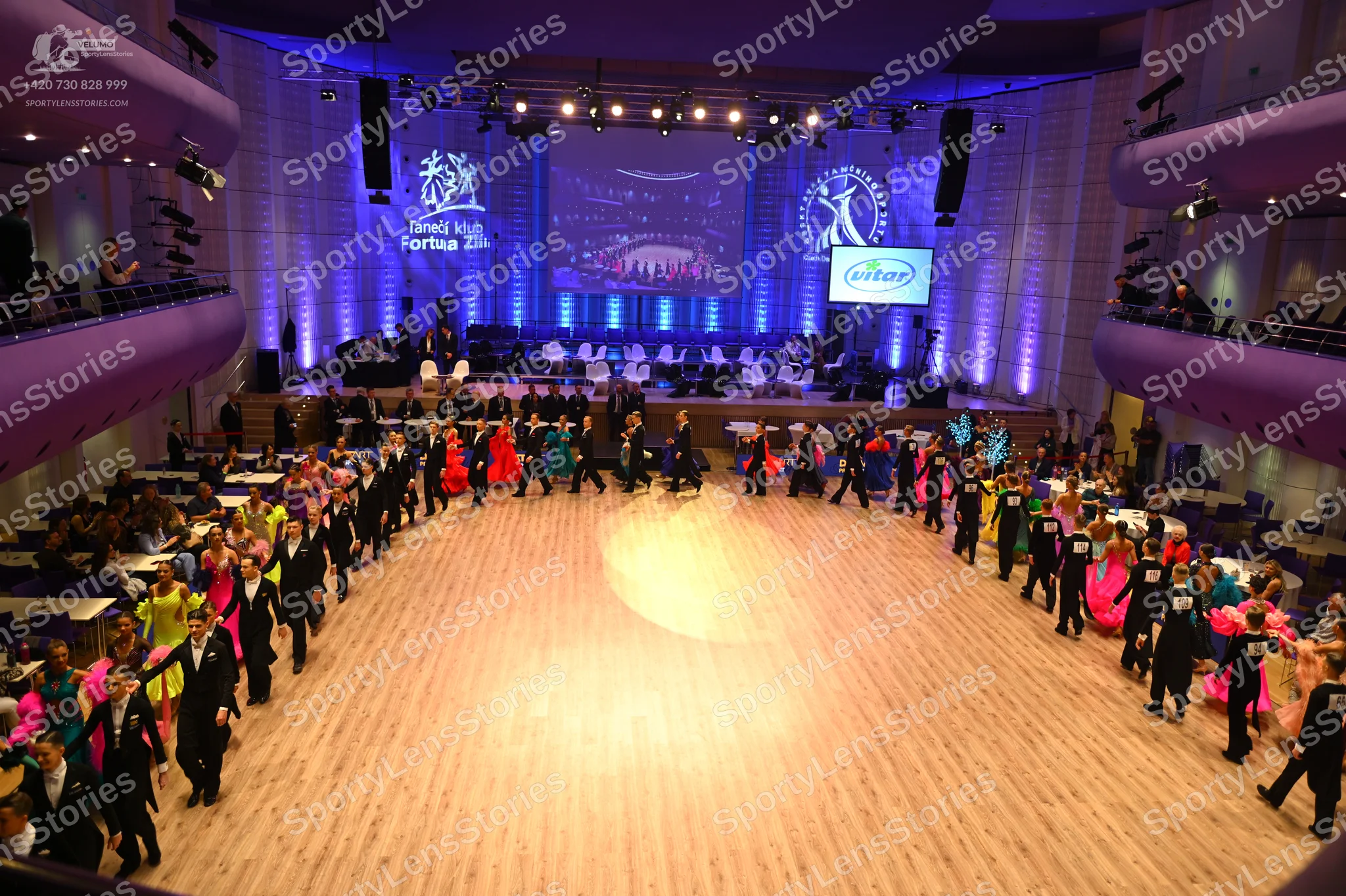 Dancesport competitor: Male dancers: black suits or tuxedos, often paired with white shirts
