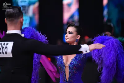 Dancesport competitor: Male dancer: black suit