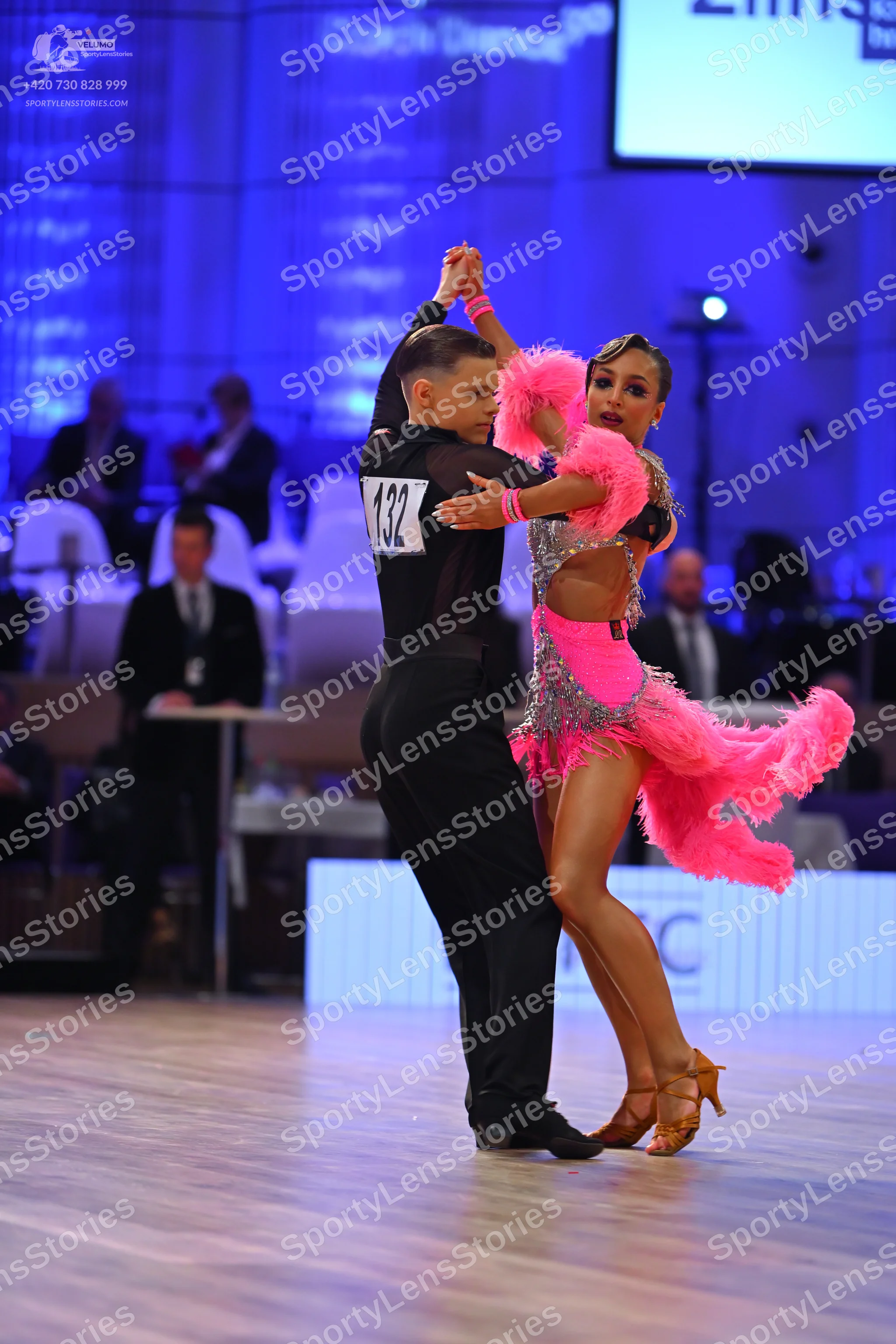 Dancesport competitor: Male dancer: black long-sleeved shirt and black trousers