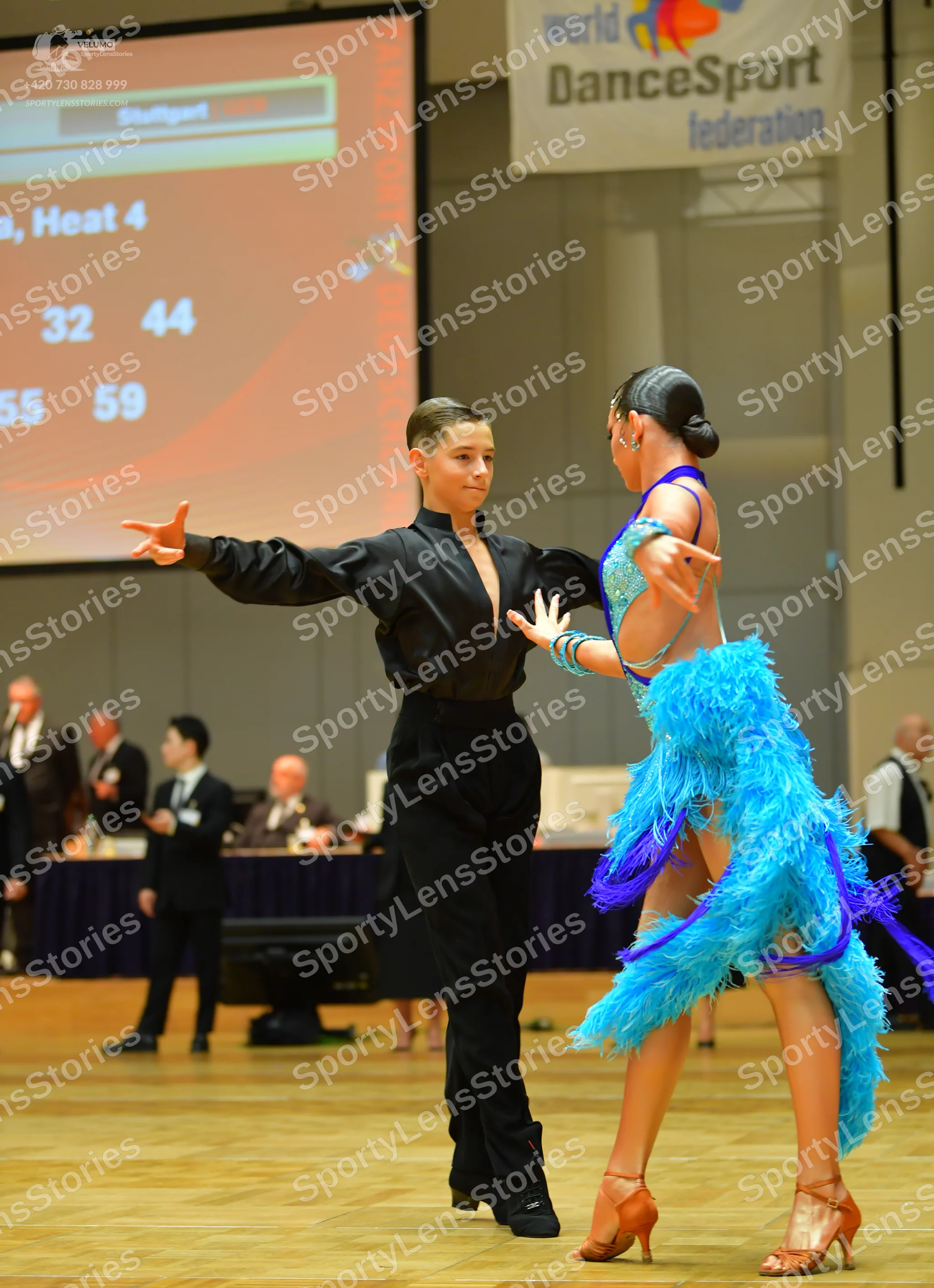 Dancesport competitor: Male dancer: black long-sleeved shirt and black trousers