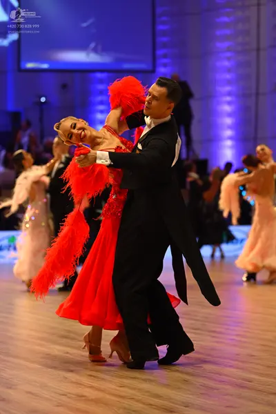 Dancesport competitor: Main male dancer: black tailcoat suit with white shirt
