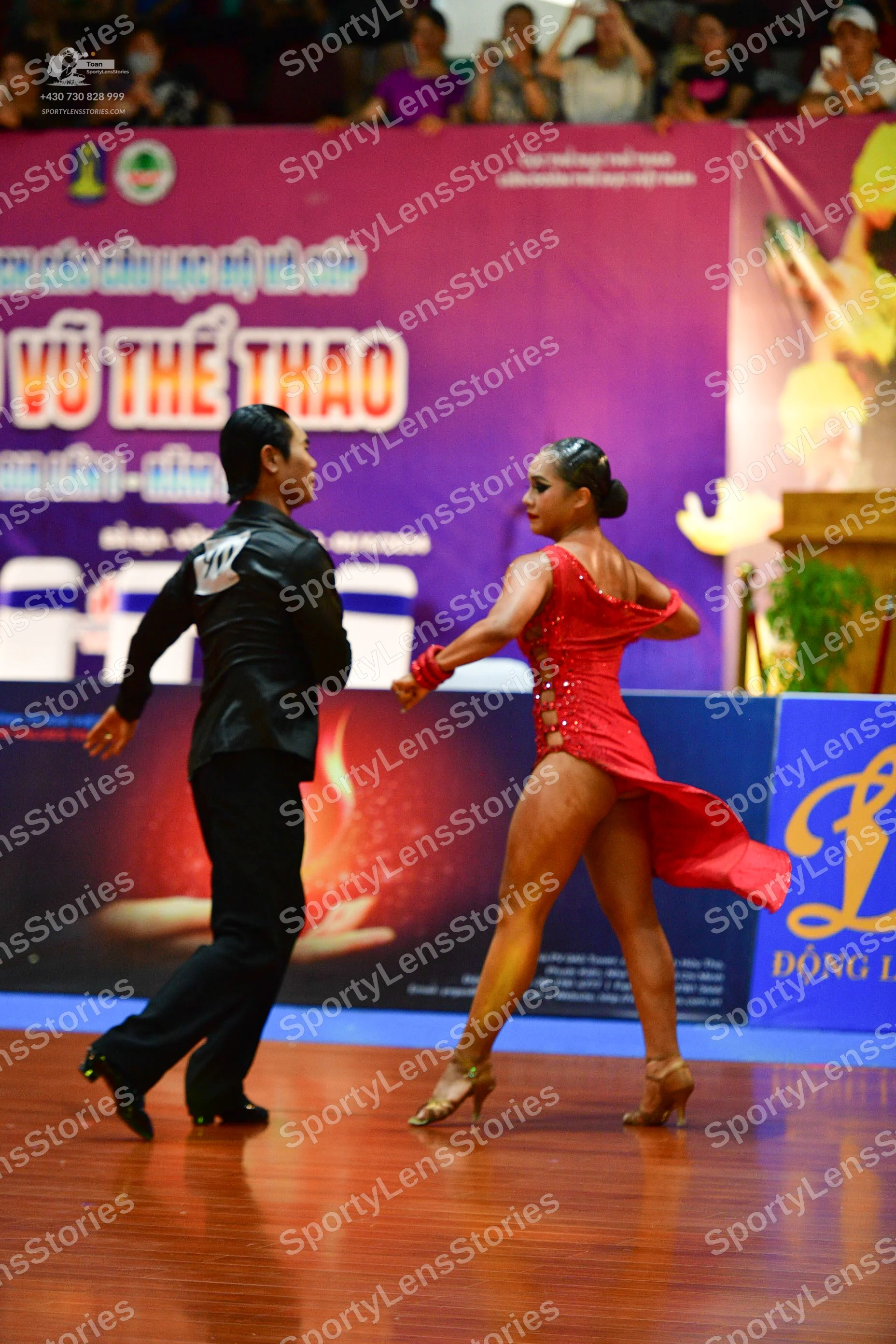 Dancesport competitor: ** Black suit with a sequin lapel