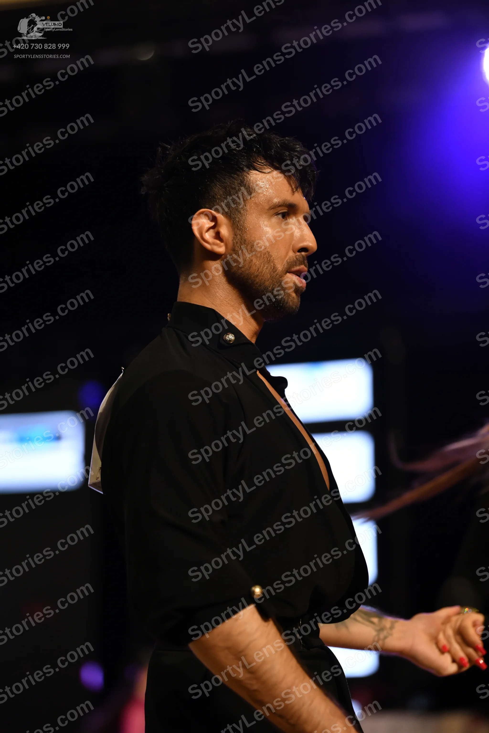 Dancesport competitor: ** Male: Black tail suit with sequin lapels