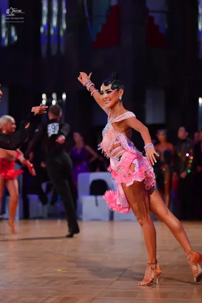 Dancesport competitor #59: Female dancer: pink latin dress with fringe and sequins