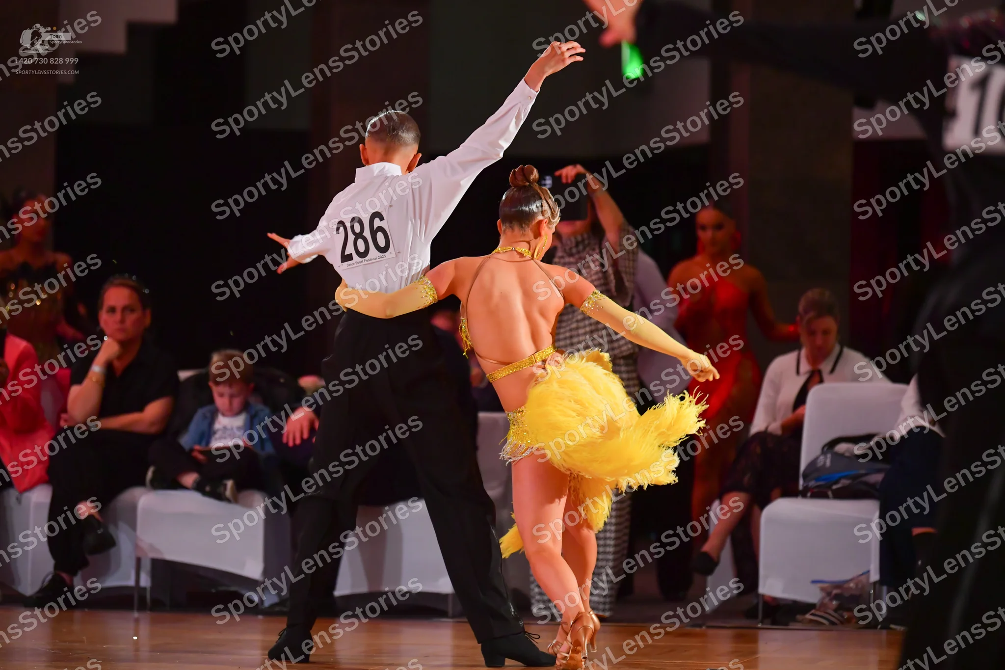 Dancesport competitor #286: Male dancer: white long-sleeved shirt and black trousers