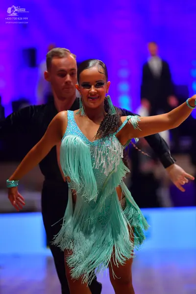 Dancesport competitor: Male dancer: black long-sleeved dance shirt