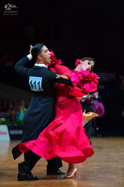 Dancesport competitor #111: Male dancer: black long-sleeved dance shirt and trousers