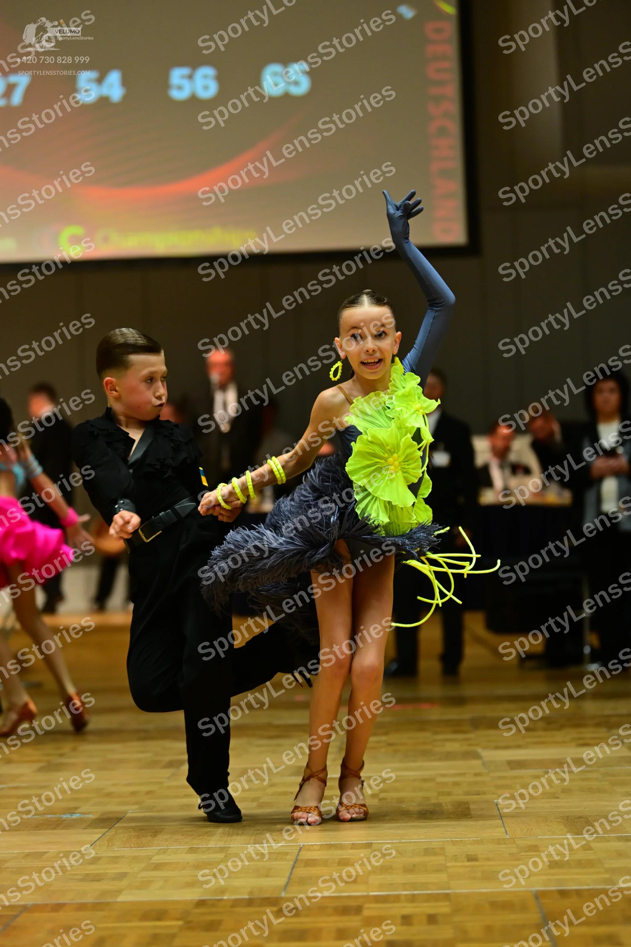 Dancesport competitor: Male dancer: black long-sleeved shirt and black trousers