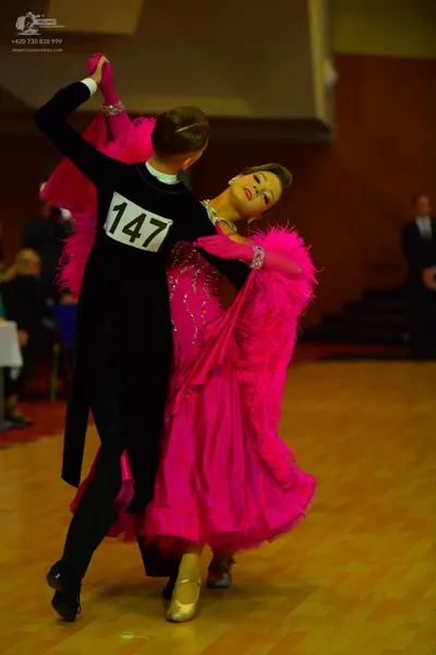 Dancesport competitor #147: Male dancer: black ballroom tailcoat with a white collar