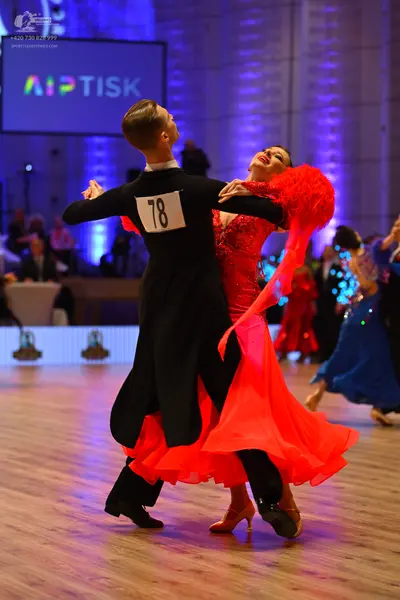 Dancesport competitor: Male dancer: black ballroom tailcoat and trousers