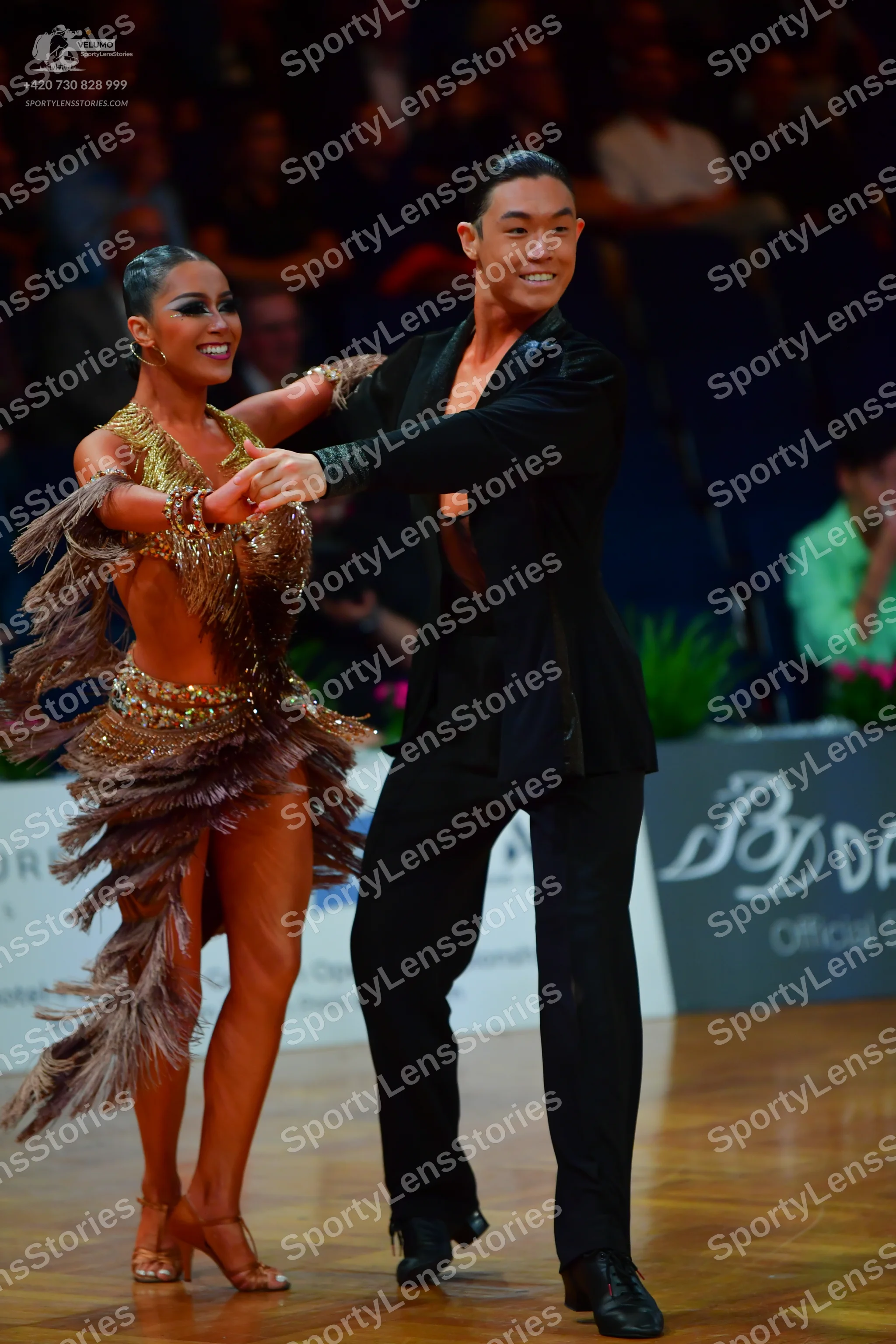 Dancesport competitor: Male dancer: black suit