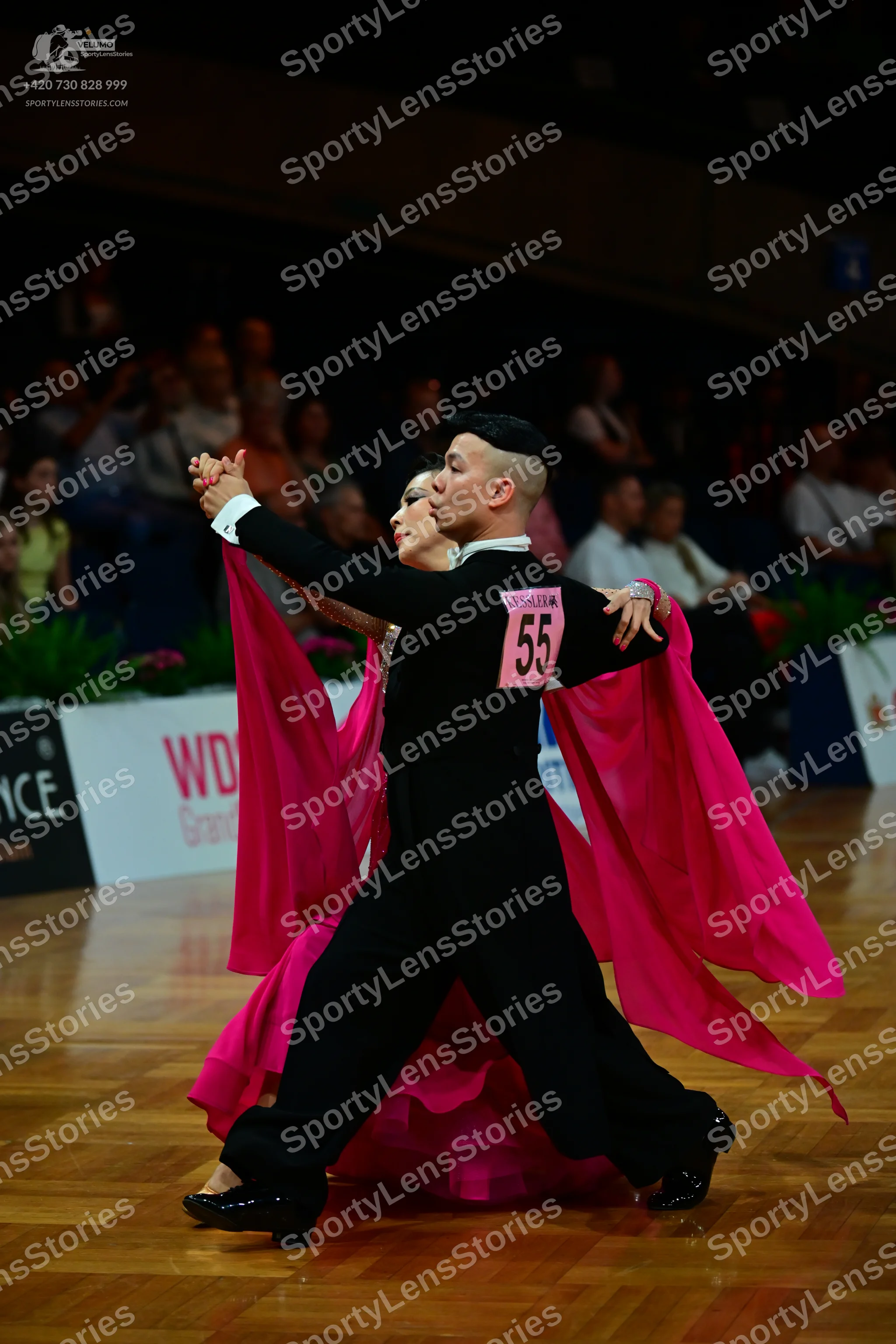 Dancesport competitor #55: Male dancer: black long-sleeved dance suit with black trousers