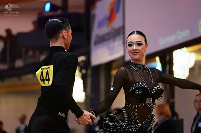 Dancesport competitor #44: Male dancer: black long-sleeved top and black trousers