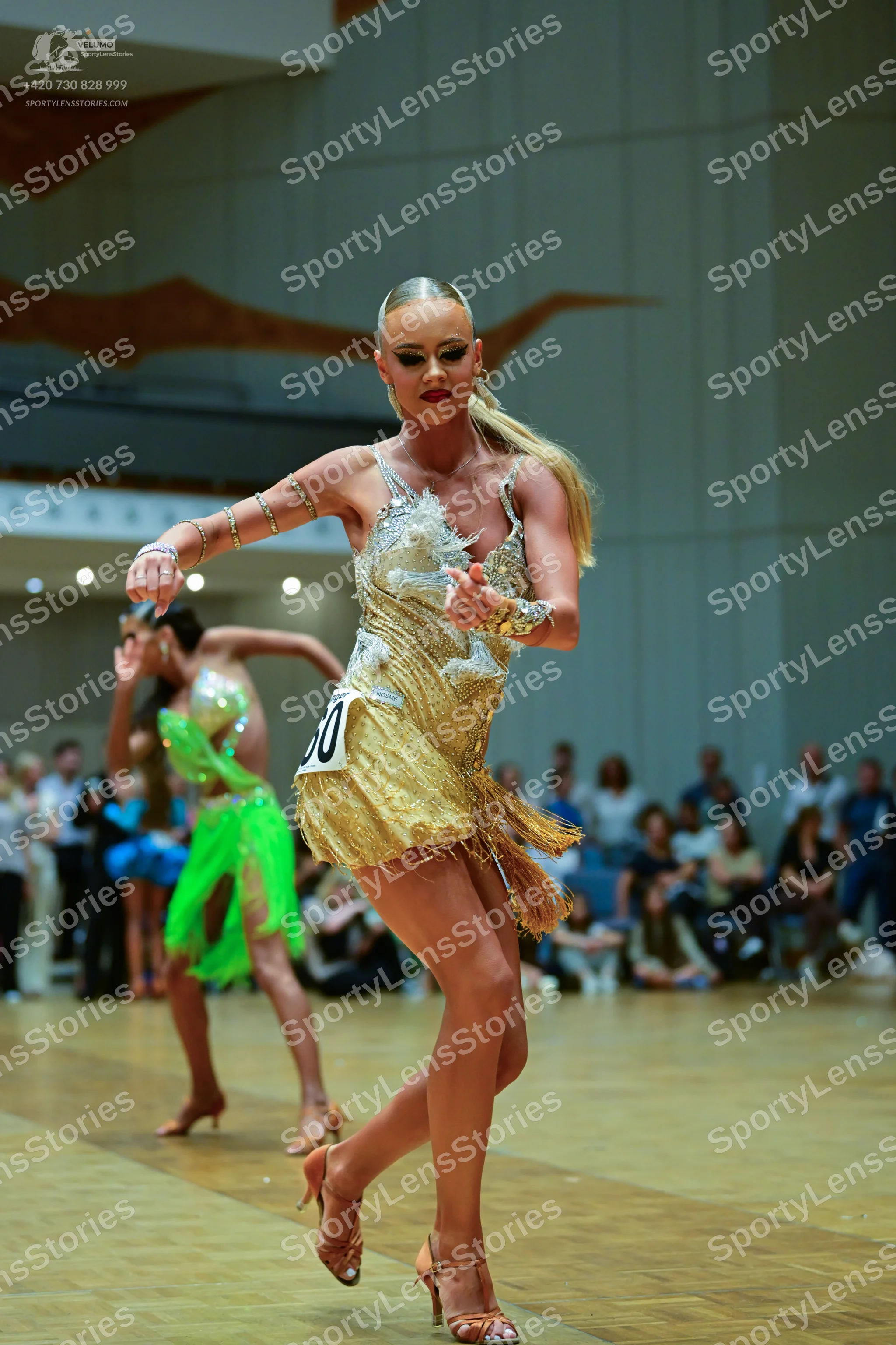 Dancesport competitor #30: Female dancer in foreground: gold sequin latin dance dress with thin straps, fri