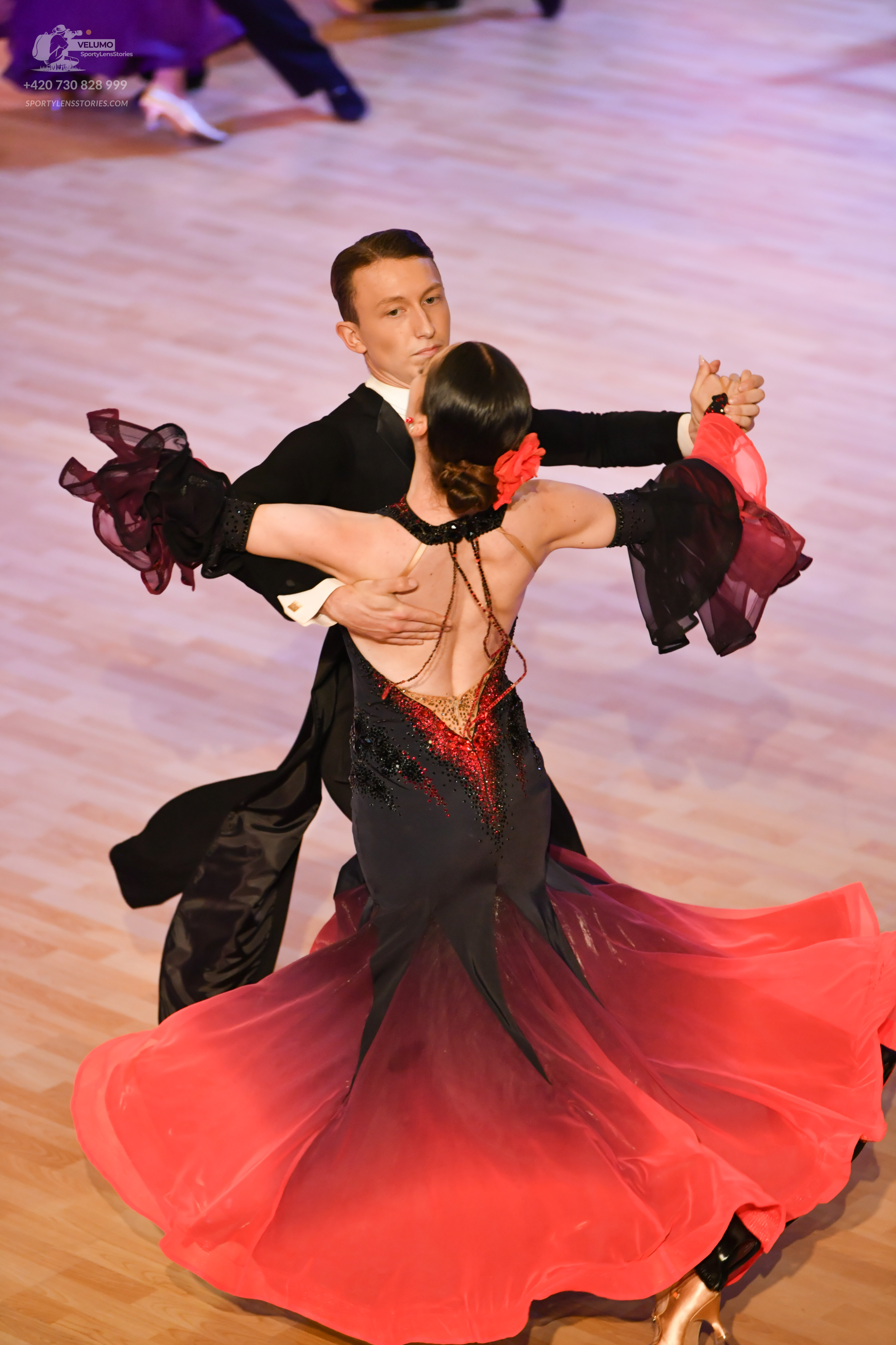 Dancesport competitor: **

**Male Dancer:** Black suit with sequin lapels