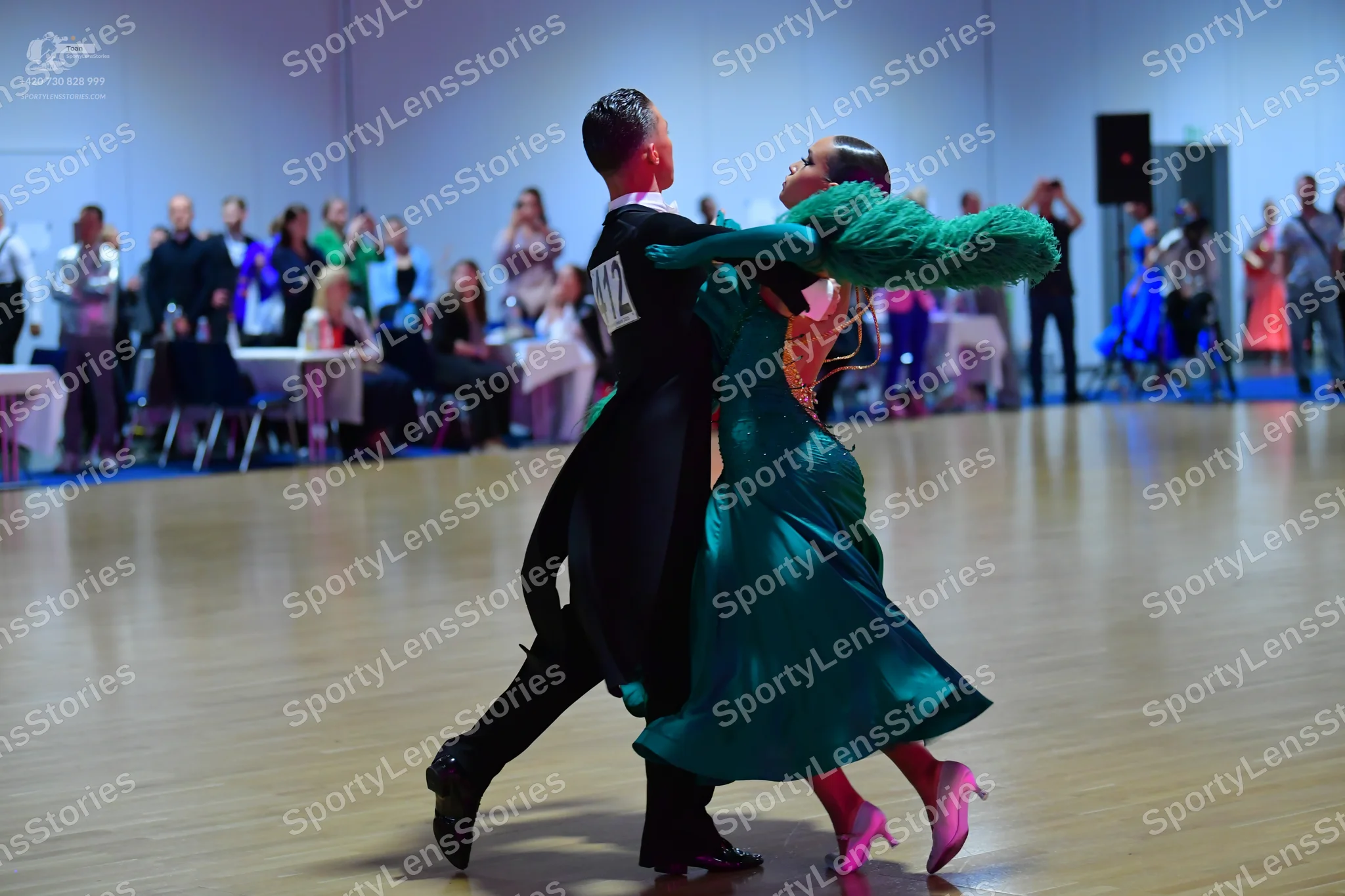 Dancesport competitor #12: Male dancer: black ballroom tailcoat, white shirt, and black trousers