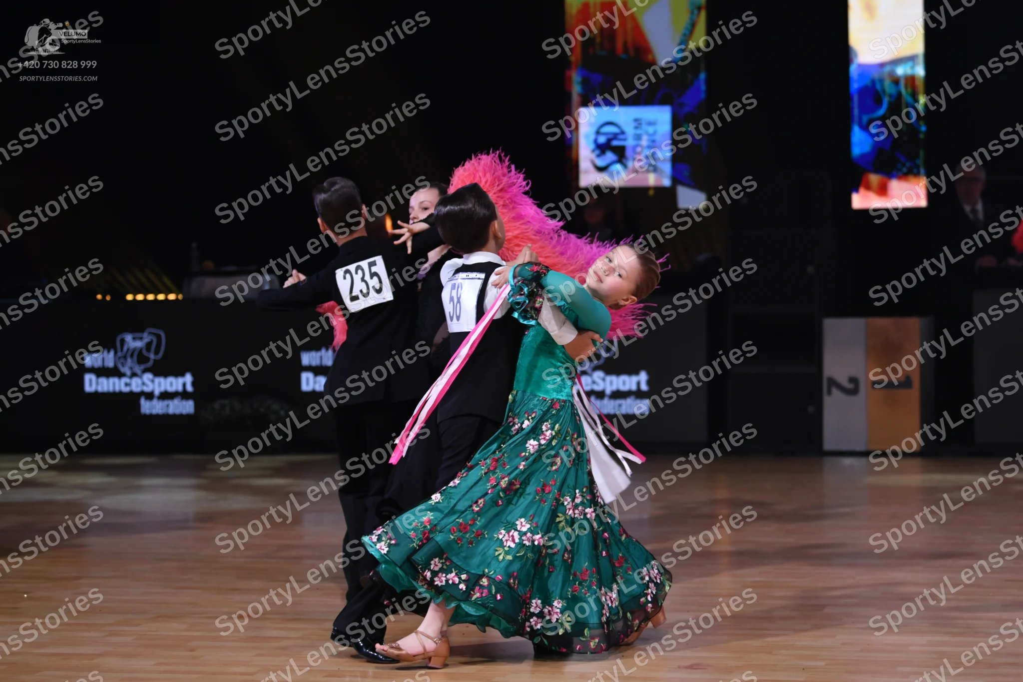 Dancesport competitor: Male dancer: black suit