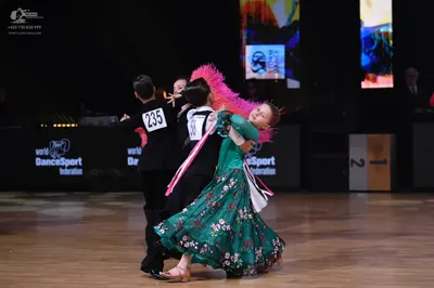 Dancesport competitor: Male dancer: black suit