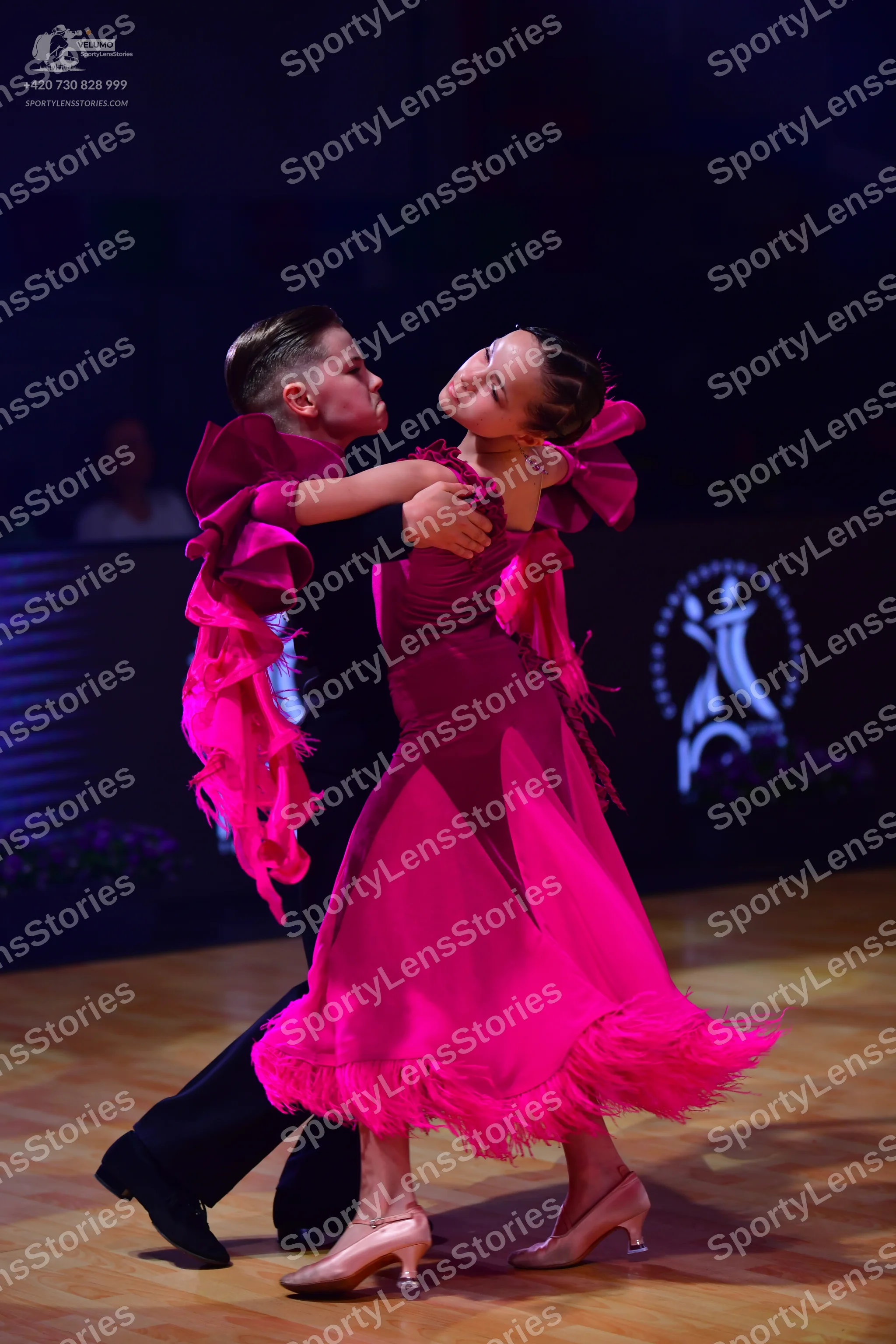 Dancesport competitor: Male dancer: black long-sleeved shirt and black trousers