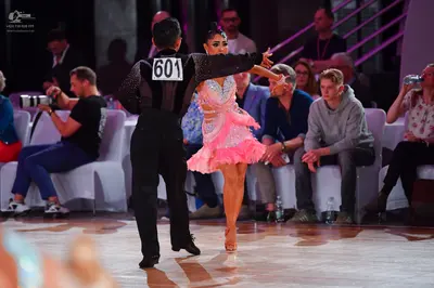 Dancesport competitor #601: Male dancer: black long-sleeved top and black trousers