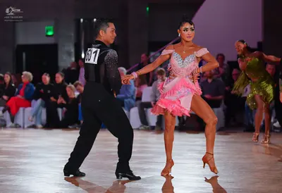 Dancesport competitor #631: Male dancer: black long-sleeved shirt with subtle sequin detail on the shoulder 