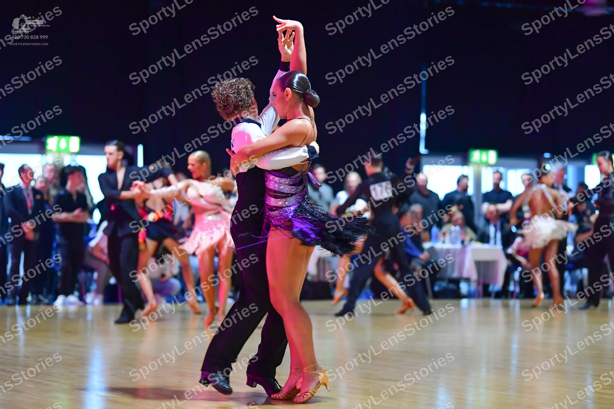 Dancesport competitor #109: Man in foreground: black trousers and white shirt
